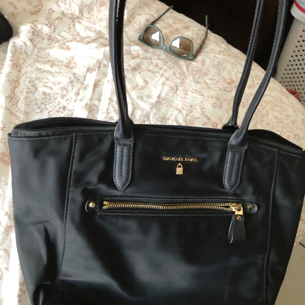 Black and gold Michael kors bag